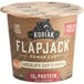 A Kodiak Cakes chocolate chip and maple flapjack cup on a table.