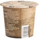 A white container of Kodiak Cakes Chocolate Chip and Maple Flapjack Cup with directions on it.