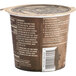 A brown Kodiak Cakes container with white and black text.