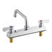 A Regency chrome deck-mounted faucet with two silver knobs.