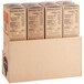 A cardboard box with several Riff's Smokehouse Bacon On the Go Raspberry Chipotle boxes inside.