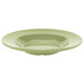 A close-up of a green GET Diamond Harvest melamine bowl.