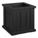 A black square planter box with a square top on a table.