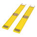 Two yellow plastic GenieGrips mats with metal handles.