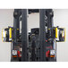A forklift with GenieGrips Slimview mirrors on the side.