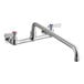 A chrome Regency wall mount faucet with silver knobs.