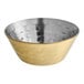 An American Metalcraft stainless steel sauce cup with a hammered gold exterior.