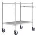 A chrome metal utility cart with two shelves and wheels.