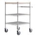 A Regency chrome utility cart with three shelves and wheels.