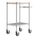 A Regency chrome utility cart with wooden shelves.