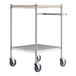 A Regency chrome utility cart with wooden shelves and wheels.