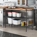 A kitchen with a Regency metal shelf on a counter.