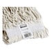 A close-up of a white Rubbermaid Super Stitch wet mop head with a label.