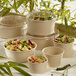 Solia bamboo fiber containers filled with a variety of food.