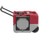 A red and grey AlorAir Storm LGR 1250X commercial dehumidifier with a black wheel.