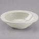 A Tuxton eggshell white narrow rim monkey dish.