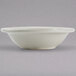 A white Tuxton narrow rim bowl.