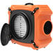 An AlorAir PureAiro industrial air scrubber in an orange and black box with a vent.