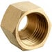 A brass 1/4" compression nut.
