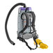 A white ProTeam backpack vacuum with a hose attached.