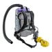 A grey and black ProTeam backpack vacuum with a hose attached.