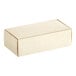 A white 1/2 lb. candy box with a white lid.