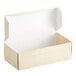 A white 1/2 lb. gold linen candy box with an open lid.