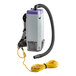 A ProTeam backpack vacuum cleaner with a cord.