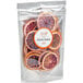 A package of dried blood orange slices on a counter.