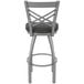 A Holland Bar Stool stainless steel outdoor counter stool with a black cushion and a metal frame.