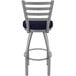 A Holland Bar Stool outdoor restaurant bar stool with a blue cushion and stainless steel frame.