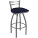 A Holland Bar Stool outdoor counter stool with a blue cushion and stainless steel frame.