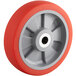 A Wesco Industrial Products wheel with a red and grey rim.