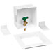 A white square Oatey ice maker outlet box with a green valve.