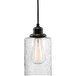 A Globe Rustic Dark Bronze pendant light with a clear glass shade on a black cord.