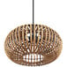 A globe rattan pendant light with a black cord.