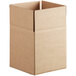 A close-up of a Lavex Kraft cardboard shipping box with a cut out top.