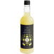A close up of a Twisted Alchemy Cold-Pressed Lemon Sour Craft Mixer bottle with a black label.