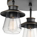 A Globe semi-flush mount light fixture with three clear glass shades.