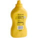 A yellow French's Classic Yellow Mustard squeeze bottle.