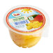 A Dole plastic container of diced mango in juice with a lid.