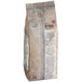 A brown bag with white text that reads "Republica del Cacao Ecuador 31% White Chocolate"