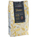 A black bag of Valrhona Jivara milk chocolate feves with yellow text on the label.