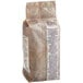 A brown bag with white text on it.
