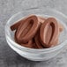 A close-up of Valrhona Caramelia milk chocolate.