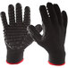 A close-up of a pair of black Impacto Blackmaxx vibration-reducing gloves.