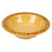 A yellow Venetian melamine bowl with a floral design.