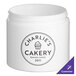 A white double wall plastic jar with the Charlie's Bakery logo on it.