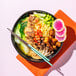 A bowl of noodles with vegetables and Blackbird Foods Seitan