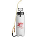 A white plastic Chapin sprayer container with a black and gold handle.